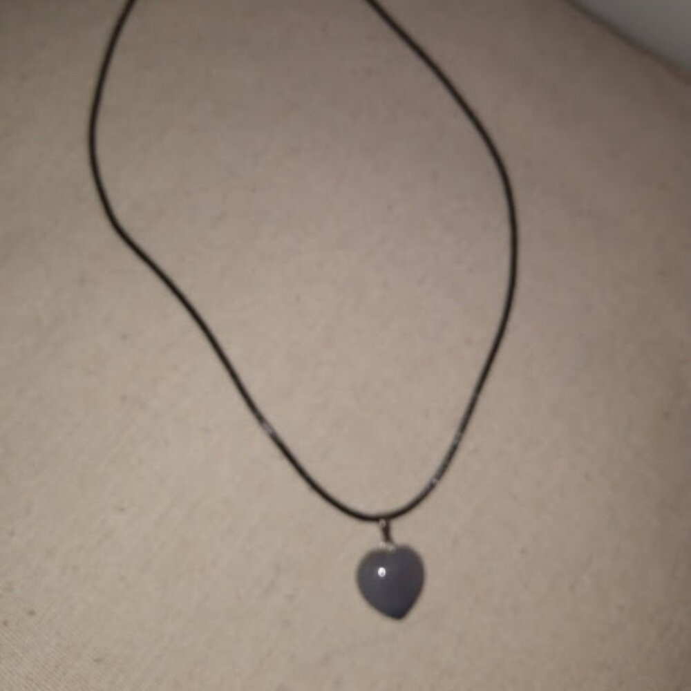 Gray heart shaped stone pendant necklace.
